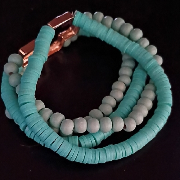 Turquoise Colored Beaded Bracelet with Gold Tone Cross Pendant - Picture 3 of 9